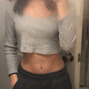 grey long sleeved top